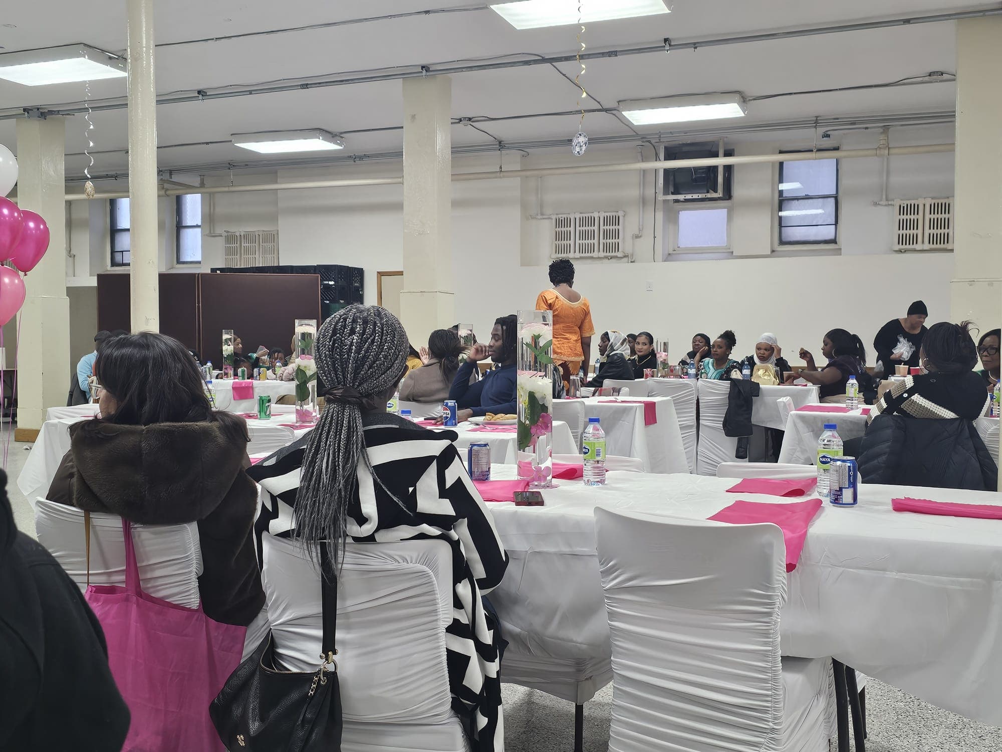 Community members connecting at a welcome event